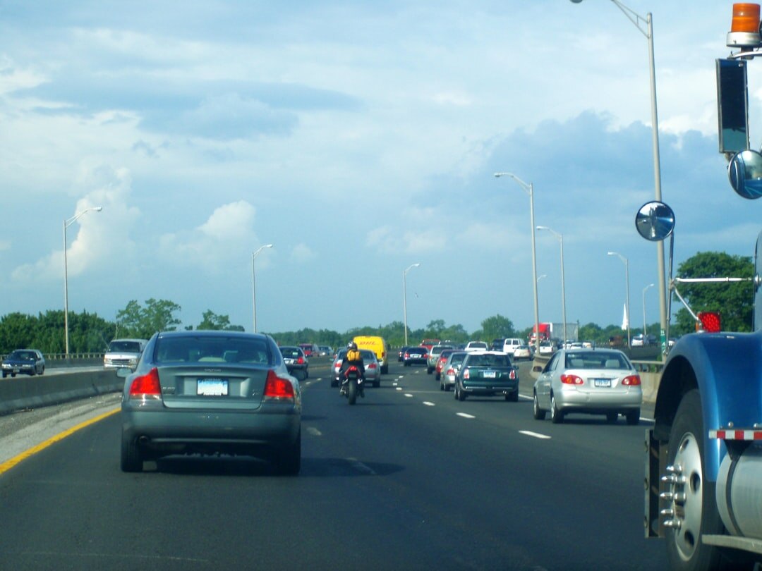 American highway with cars at sunset