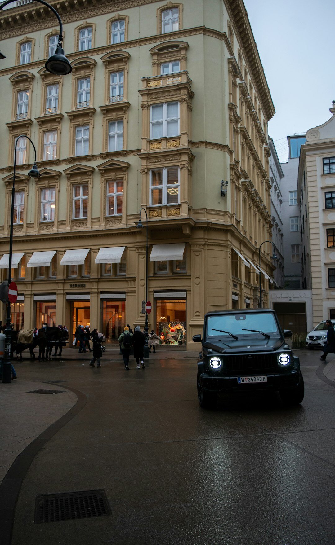 European city street with parked premium cars